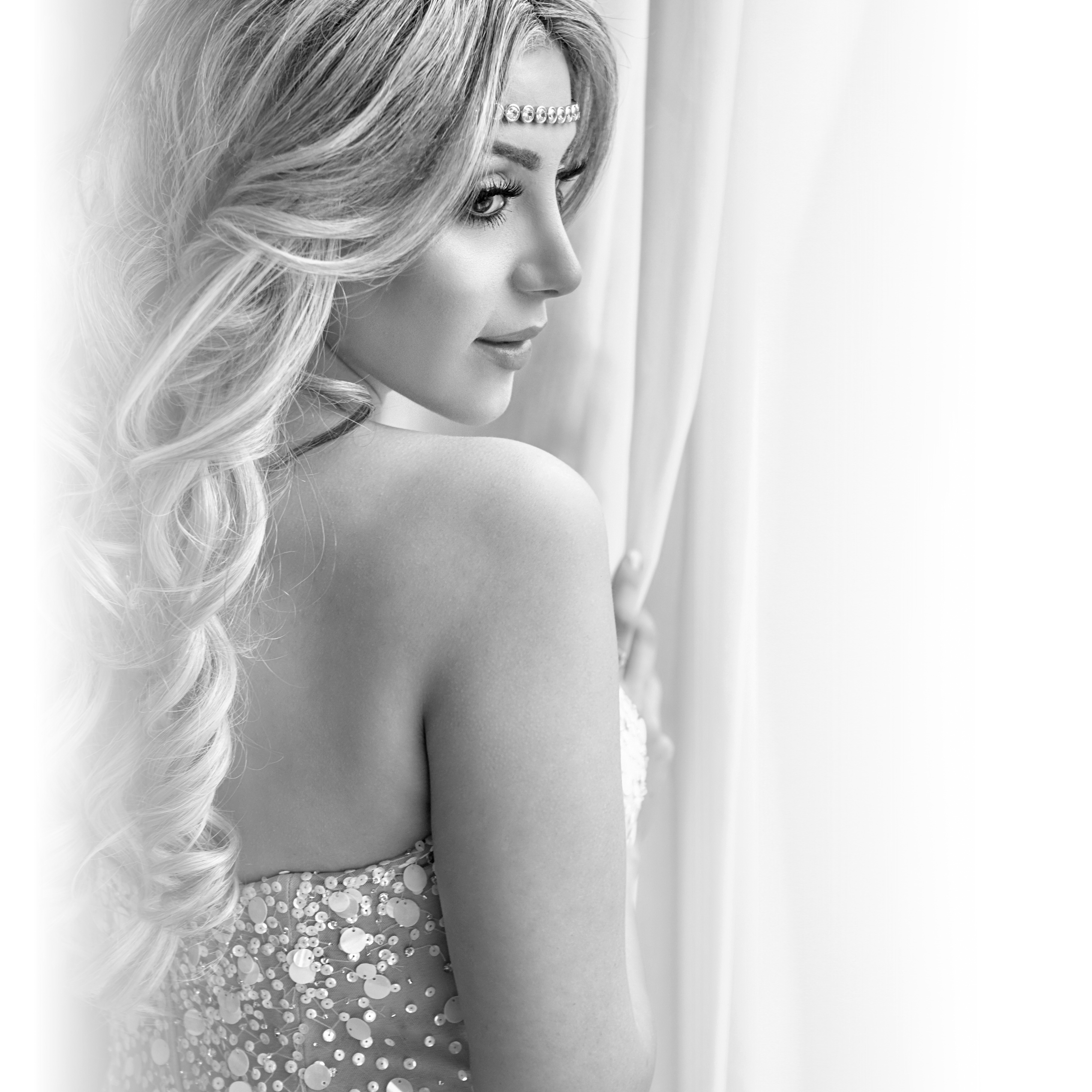 Bride in profile in high-key light