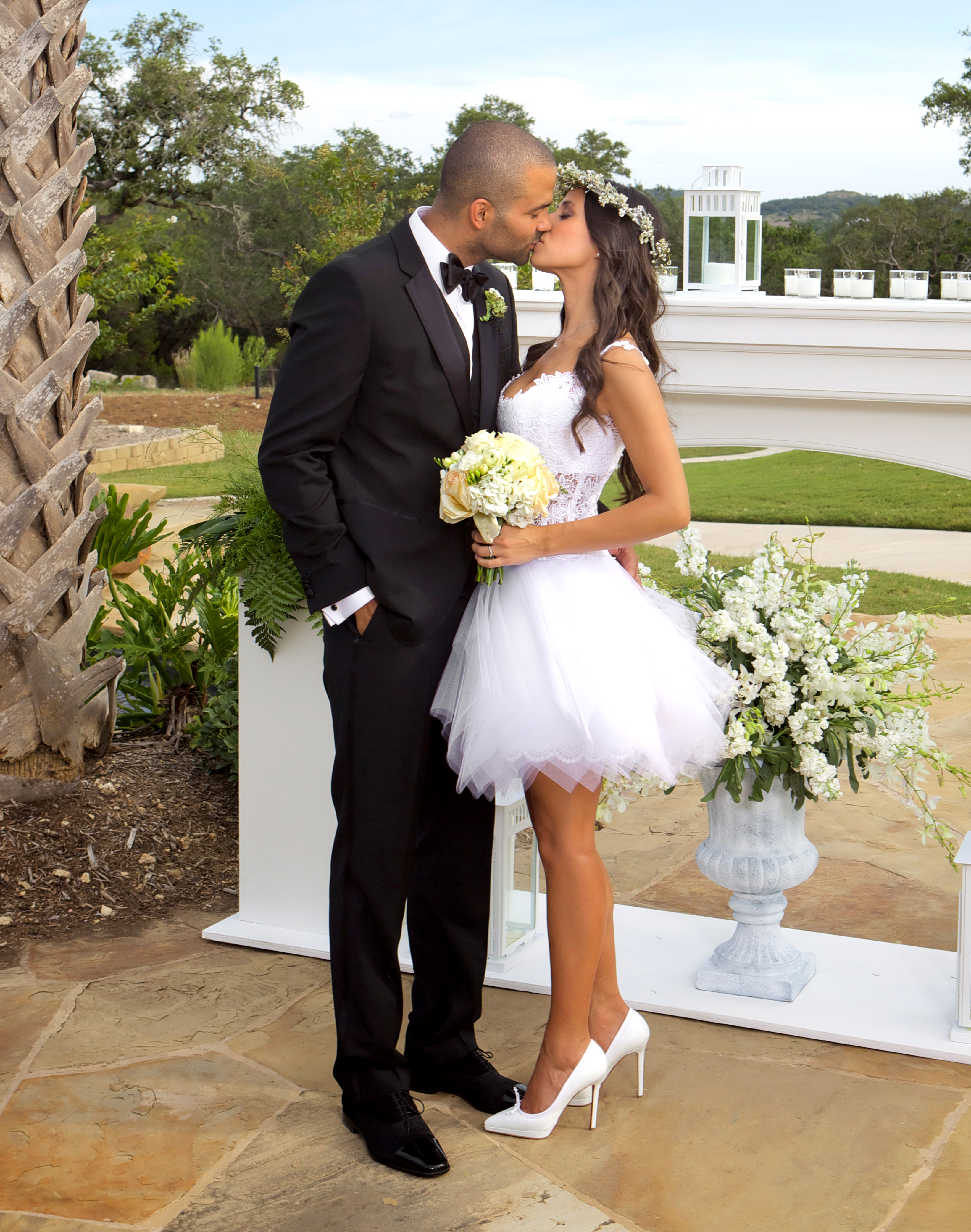 Couple kissing at the ceremony